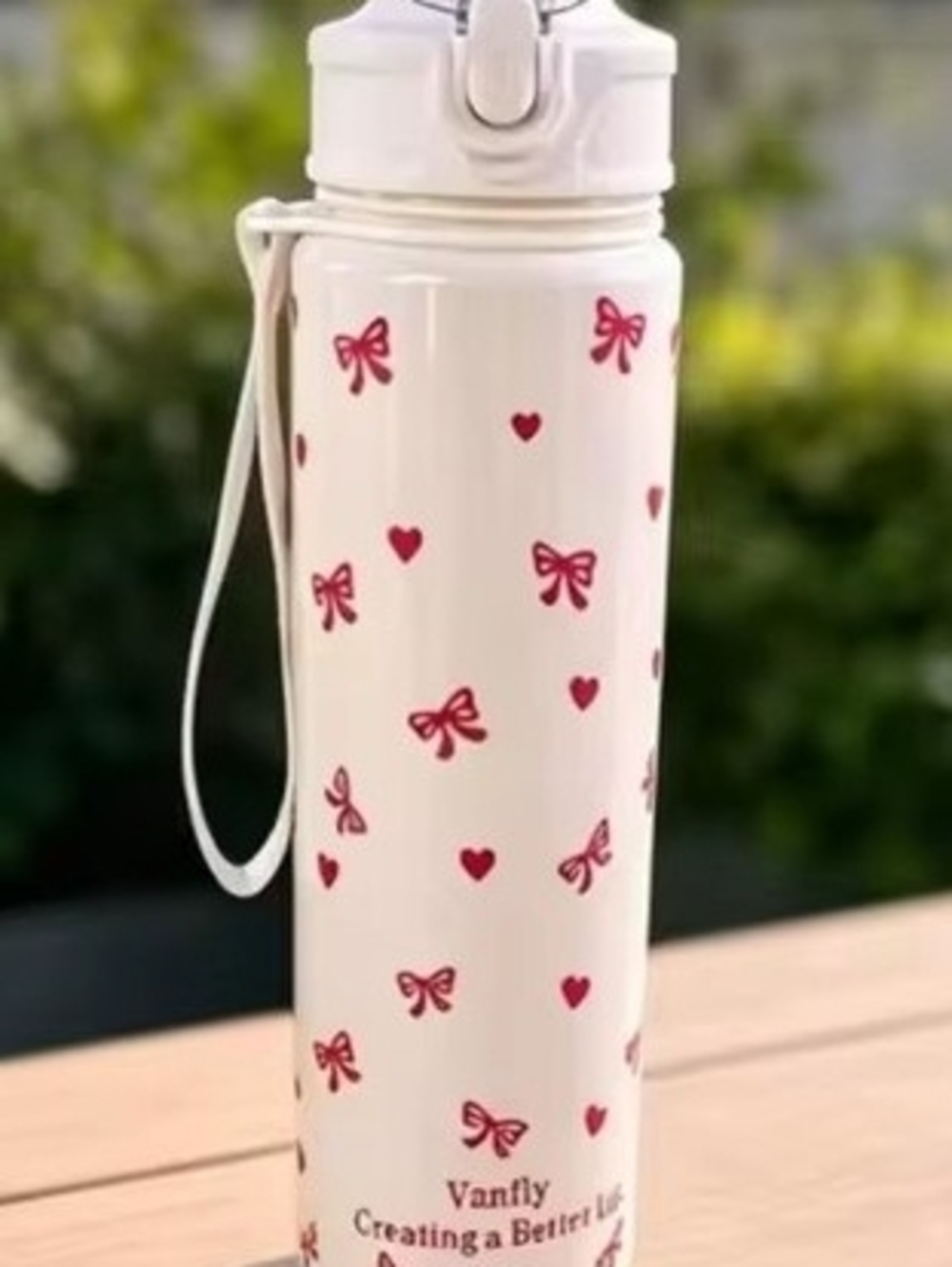 Womens White Water Bottle with Pink Hearts & Bows. Measurents And Ozs Included .